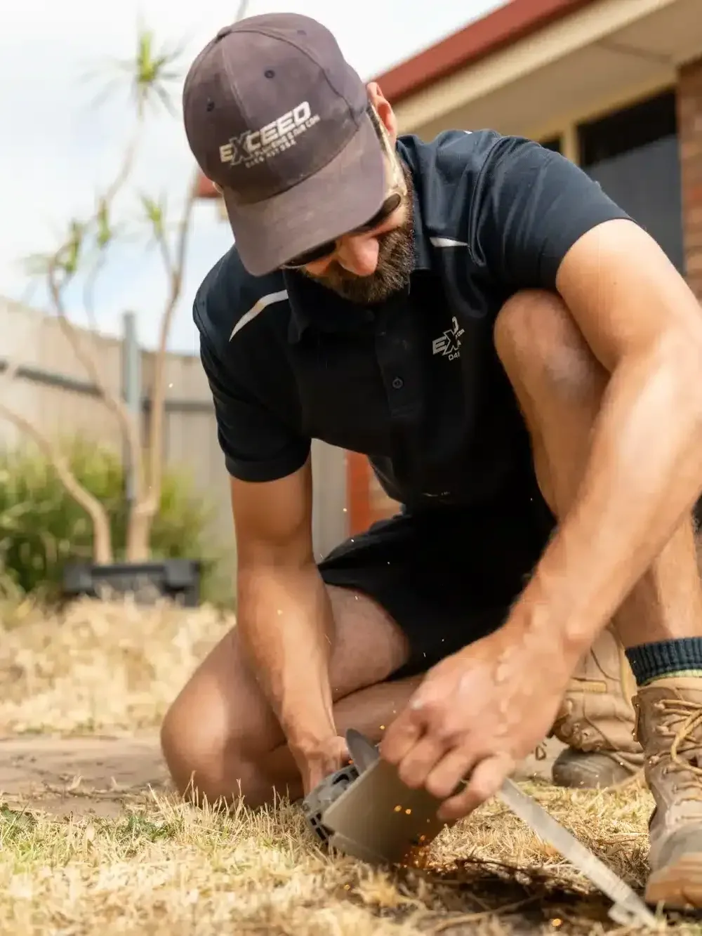 A Flagstaff Hill plumber at work on a job